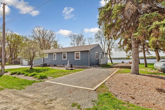17055 Dickenson Ln, Waterville, MN 56096 - single story home with driveway, a water view, and cooling unit
