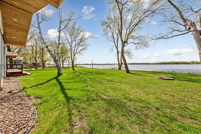 17055 Dickenson Ln, Waterville, MN 56096 - view of green lawn featuring a deck with water view