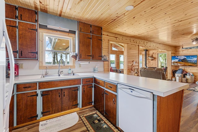17055 Dickenson Ln, Waterville, MN 56096 - kitchen with dishwasher, a sink, wood ceiling, open floor plan, and a peninsula