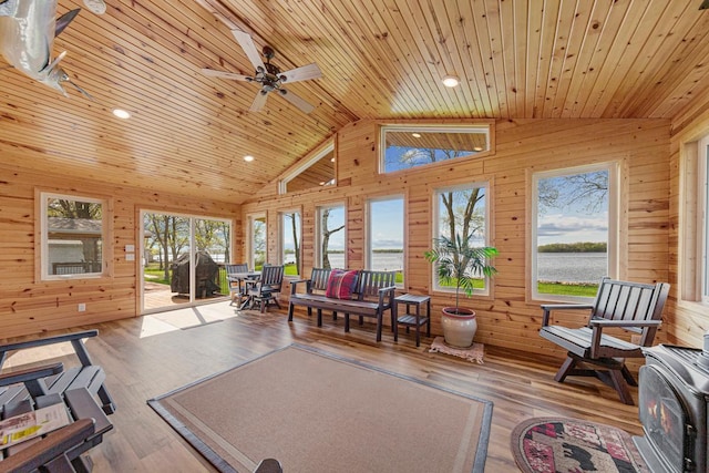 17055 Dickenson Ln, Waterville, MN 56096 - sunroom / solarium featuring vaulted ceiling, healthy amount of natural light, and a water view