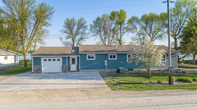 17055 Dickenson Ln, Waterville, MN 56096 - ranch-style house featuring an attached garage, driveway, central AC, and a front yard