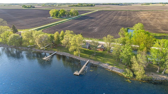 17055 Dickenson Ln, Waterville, MN 56096 - aerial overview of property's location with rural landscape, rows of crops, and a large body of water