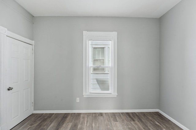 852 Edmund Ave, Saint Paul, MN 55104 - spare room featuring wood finished floors and baseboards