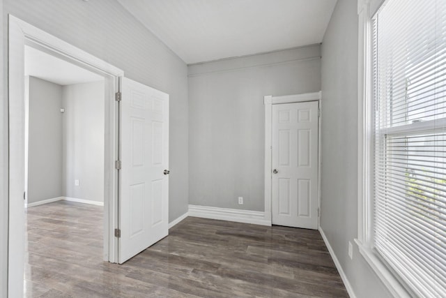 852 Edmund Ave, Saint Paul, MN 55104 - unfurnished room featuring wood finished floors and baseboards