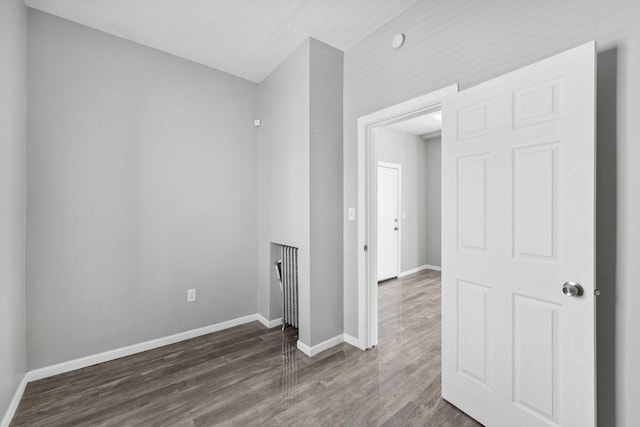 852 Edmund Ave, Saint Paul, MN 55104 - empty room with dark wood finished floors and baseboards