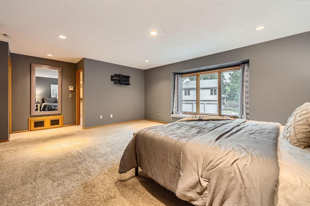 58 Garden Dr, Burnsville, MN 55337 - carpeted bedroom with a textured ceiling, recessed lighting, and baseboards