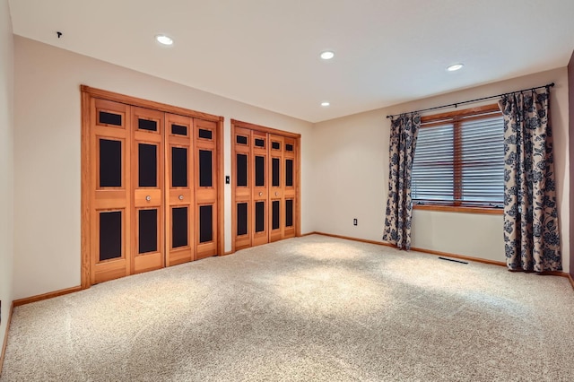 58 Garden Dr, Burnsville, MN 55337 - carpeted spare room featuring baseboards and recessed lighting