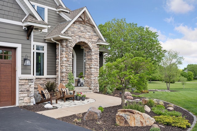 19820 Schutte Farm Rd, Corcoran, MN 55340 - entrance to property featuring stone siding, a yard, and roof with shingles