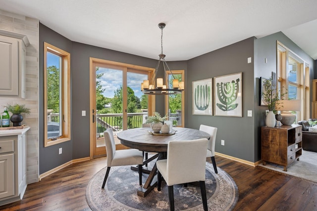 19820 Schutte Farm Rd, Corcoran, MN 55340 - dining space featuring dark wood-type flooring, a chandelier, and baseboards