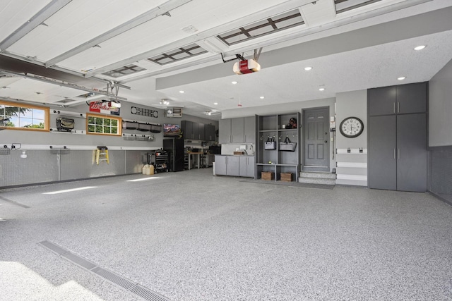 19820 Schutte Farm Rd, Corcoran, MN 55340 - garage featuring a garage door opener and recessed lighting