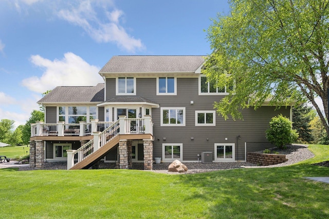 19820 Schutte Farm Rd, Corcoran, MN 55340 - back of house with stairs, central AC unit, a wooden deck, a lawn, and roof with shingles