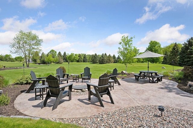19820 Schutte Farm Rd, Corcoran, MN 55340 - view of patio featuring an outdoor fire pit and view of wooded area