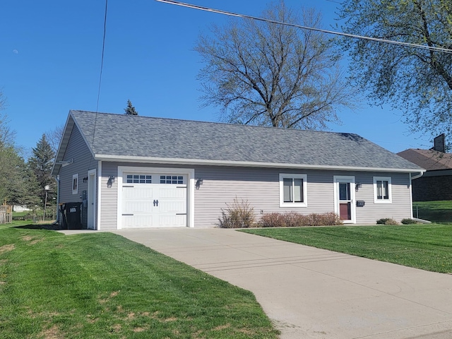 411 Bullis St, Kenyon, MN 55946 - view of front of property featuring a front lawn, driveway, and roof with shingles