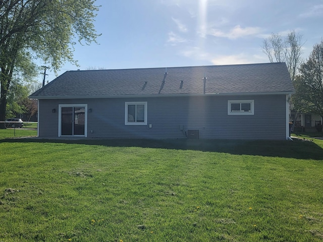 411 Bullis St, Kenyon, MN 55946 - rear view of property with a lawn