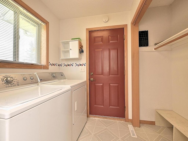 38850 Christie Ln, Cohasset, MN 55721 - laundry room featuring washer and dryer and baseboards