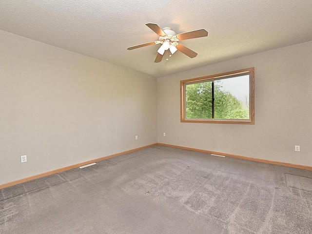 38850 Christie Ln, Cohasset, MN 55721 - empty room with a ceiling fan, baseboards, and carpet