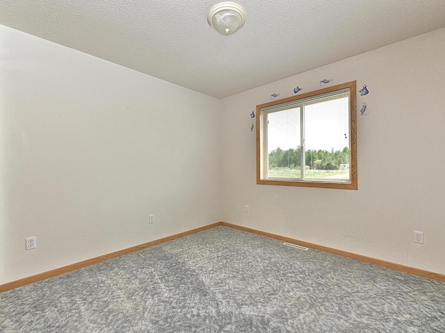 38850 Christie Ln, Cohasset, MN 55721 - carpeted spare room featuring baseboards