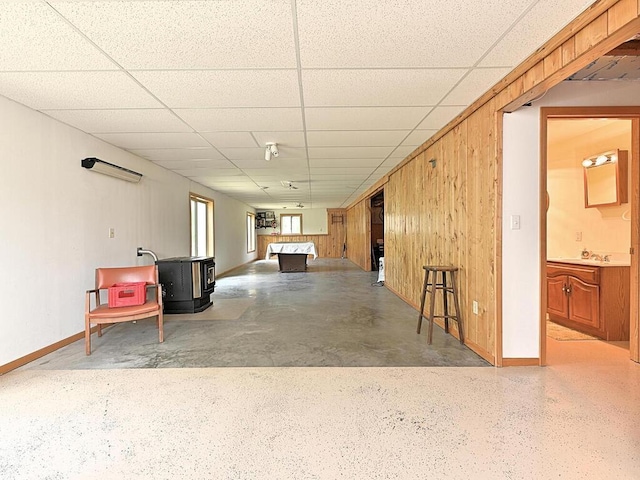 38850 Christie Ln, Cohasset, MN 55721 - interior space featuring baseboards, wood walls, and a paneled ceiling