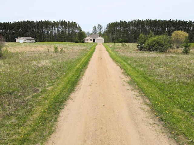 38850 Christie Ln, Cohasset, MN 55721 - view of dirt / gravel driveway with a view of trees and a view of rural / pastoral area