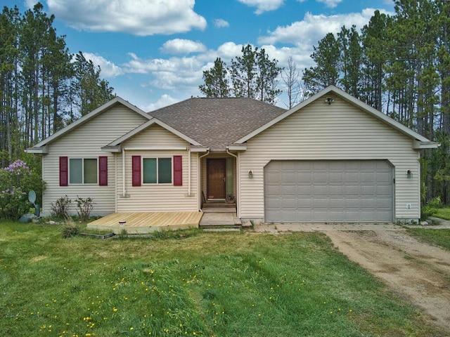 38850 Christie Ln, Cohasset, MN 55721 - ranch-style home featuring driveway, a garage, a front yard, and a shingled roof