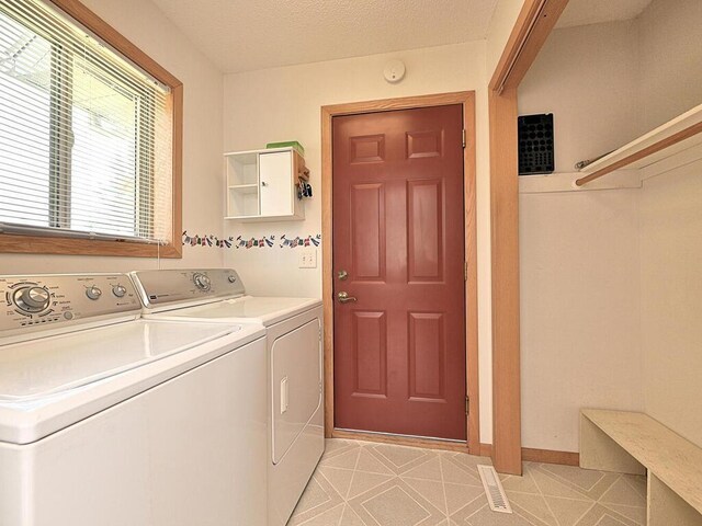 38850 Christie Ln, Cohasset, MN 55721 - laundry area with washer and dryer and baseboards