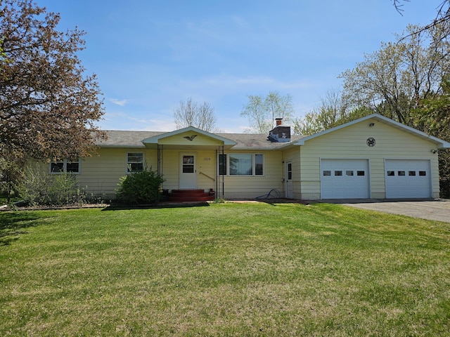 1010 Inman St, Henning, MN 56551 - single story home featuring driveway, a garage, a front lawn, and a chimney