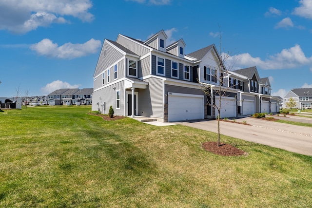 192 Junco Rd N, Lake Elmo, MN 55042 - view of side of property with a residential view, concrete driveway, an attached garage, and a lawn