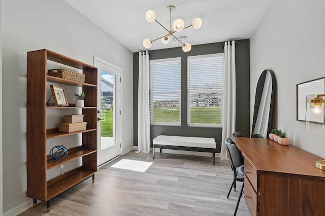 192 Junco Rd N, Lake Elmo, MN 55042 - office space with a chandelier, light wood-type flooring, and baseboards