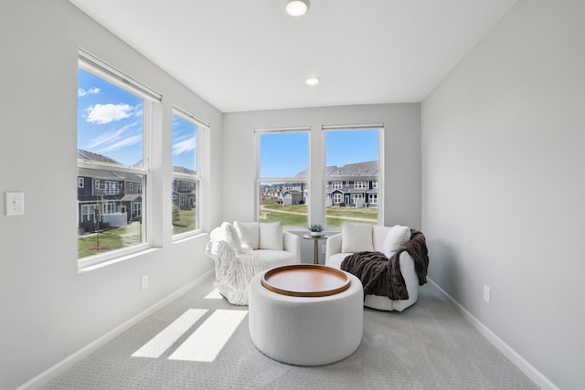 192 Junco Rd N, Lake Elmo, MN 55042 - living area featuring baseboards, carpet flooring, plenty of natural light, and recessed lighting