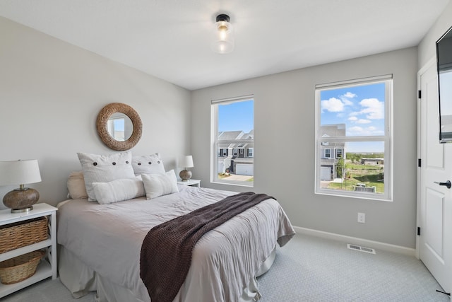 192 Junco Rd N, Lake Elmo, MN 55042 - carpeted bedroom featuring baseboards