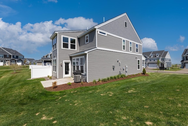 192 Junco Rd N, Lake Elmo, MN 55042 - back of property featuring a lawn and a residential view