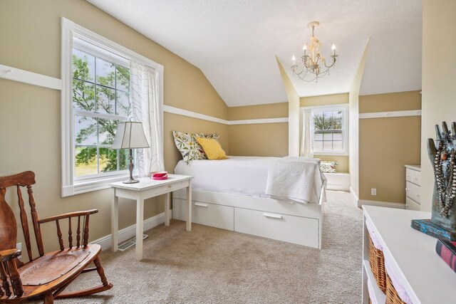 5225 Upland Ave, New Germany, MN 55367 - bedroom with a chandelier, vaulted ceiling, light colored carpet, and baseboards