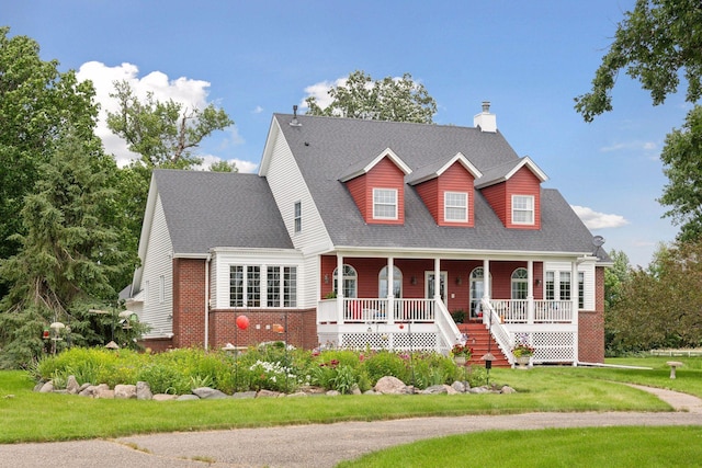 5225 Upland Ave, New Germany, MN 55367 - cape cod-style house featuring a porch, a chimney, a front lawn, roof with shingles, and stairs