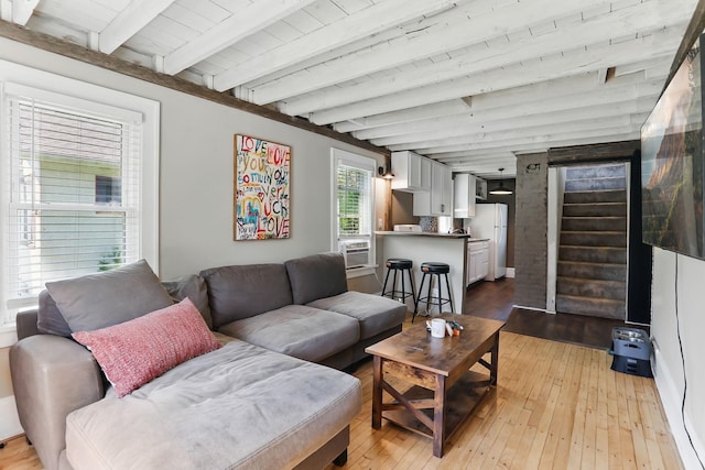 3519 Upton Ave N, Minneapolis, MN 55412 - living room with light wood-style flooring and wood ceiling with exposed beams