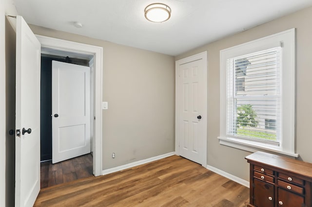 3519 Upton Ave N, Minneapolis, MN 55412 - unfurnished bedroom featuring wood finished floors and baseboards