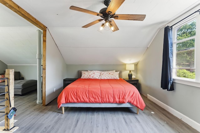 3519 Upton Ave N, Minneapolis, MN 55412 - bedroom with wood finished floors, lofted ceiling, baseboards, and ceiling fan