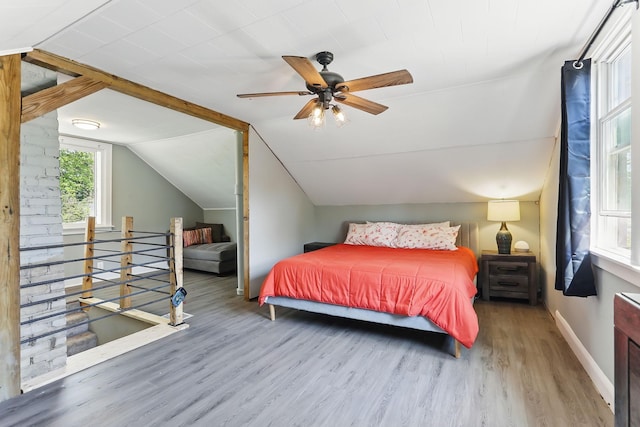 3519 Upton Ave N, Minneapolis, MN 55412 - bedroom with wood finished floors, baseboards, lofted ceiling, and a ceiling fan