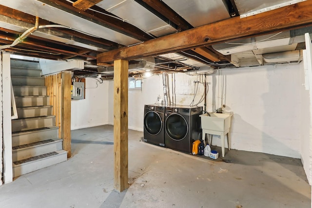 3519 Upton Ave N, Minneapolis, MN 55412 - below grade area featuring independent washer and dryer, electric panel, and stairs