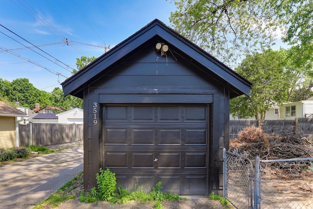 3519 Upton Ave N, Minneapolis, MN 55412 - detached garage featuring a gate