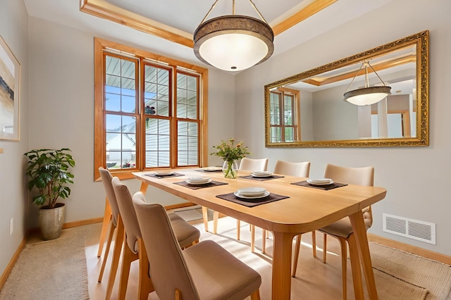 1376 Cobblestone Rd N, Champlin, MN 55316 - dining space featuring a raised ceiling and ornamental molding