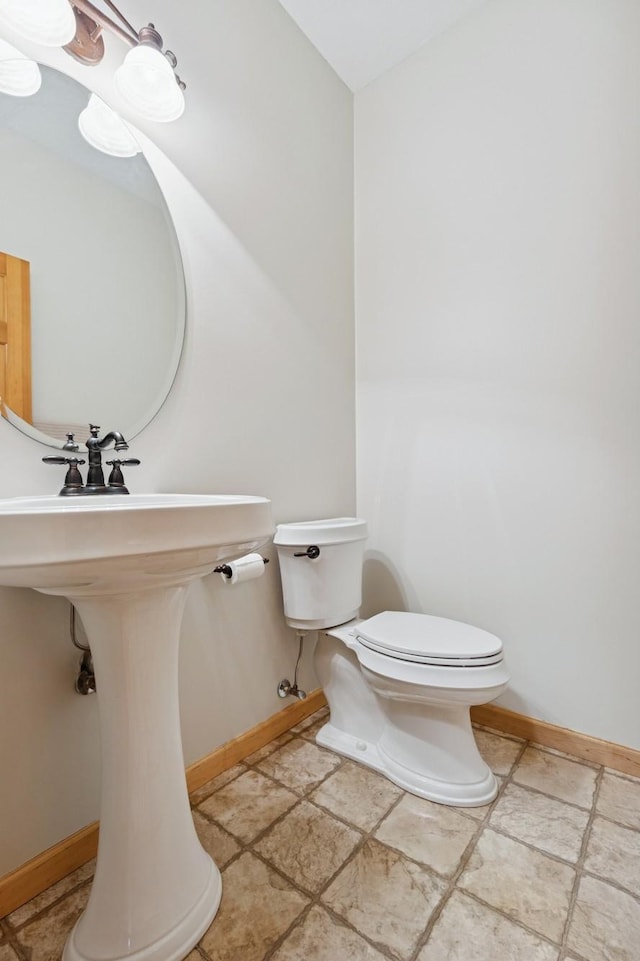 1376 Cobblestone Rd N, Champlin, MN 55316 - bathroom with toilet and stone finish floors