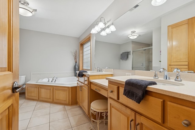 1376 Cobblestone Rd N, Champlin, MN 55316 - bathroom featuring a shower stall, tile patterned floors, vanity, and a bath