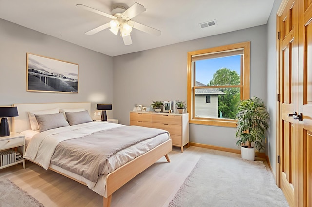 1376 Cobblestone Rd N, Champlin, MN 55316 - bedroom featuring light wood finished floors and a ceiling fan