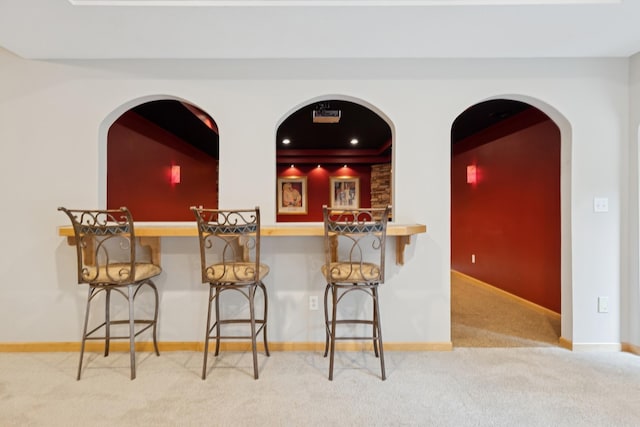 1376 Cobblestone Rd N, Champlin, MN 55316 - bar area featuring carpet flooring and baseboards