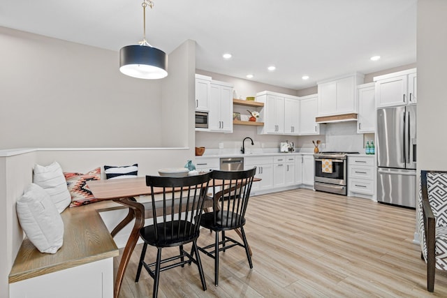 2454 County Road D W, Roseville, MN 55112 - dining space with light wood-style floors and recessed lighting