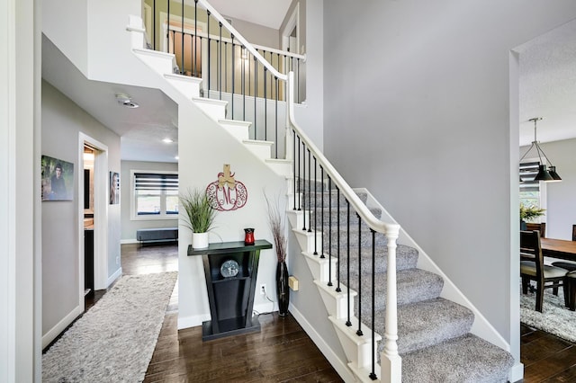 14590 Thicket Ln, Dayton, MN 55327 - stairway with wood finished floors and baseboards