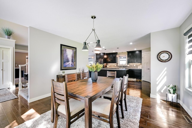 14590 Thicket Ln, Dayton, MN 55327 - dining space featuring dark wood-type flooring, baseboards, and recessed lighting
