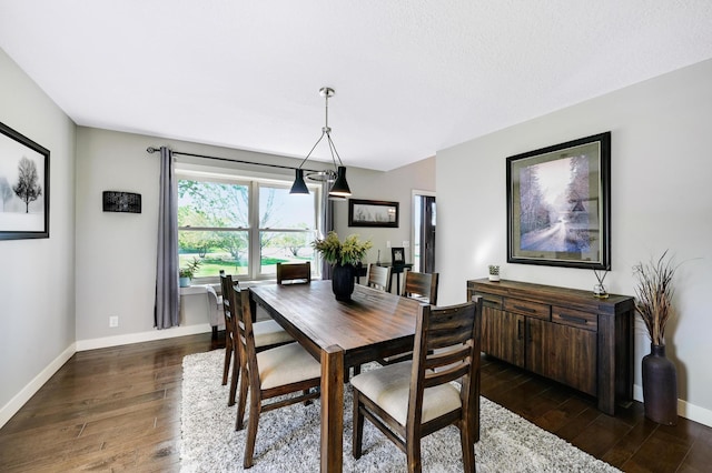 14590 Thicket Ln, Dayton, MN 55327 - dining area featuring dark wood-style flooring and baseboards