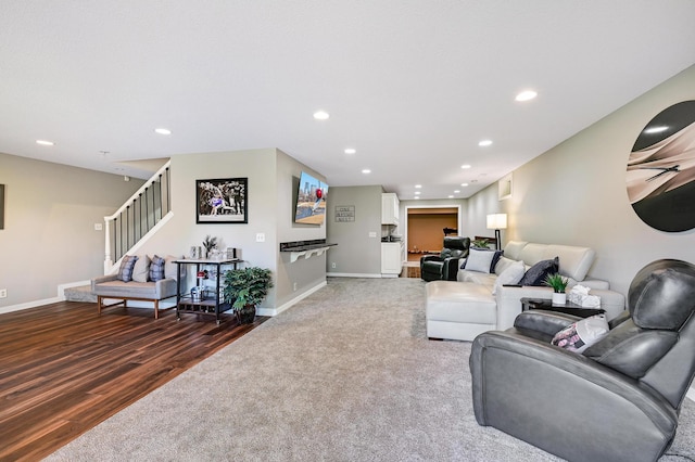 14590 Thicket Ln, Dayton, MN 55327 - living area featuring carpet, recessed lighting, baseboards, stairs, and wood finished floors