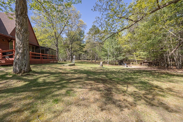 5305 Cisco Ln NE, Remer, MN 56672 - view of grassy yard with a wooden deck